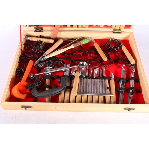 101 - Chinese made Vogue garnishing eighty piece carving tool set in original box.