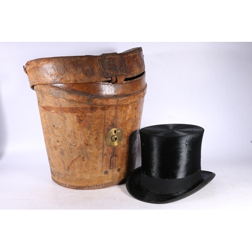 102 - Lincoln Bennett & Co. of London top hat in large leather carrying box.