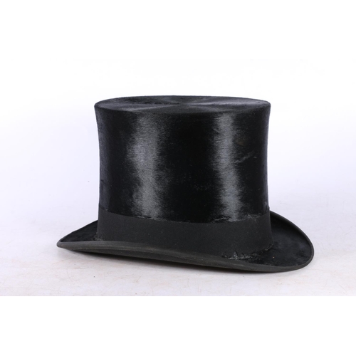 102 - Lincoln Bennett & Co. of London top hat in large leather carrying box.