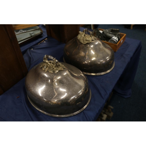 106 - Two large silver-plated cloches with ornate oak leaf and acorn handles, 48cm x 38cm, 28cm high inclu... 