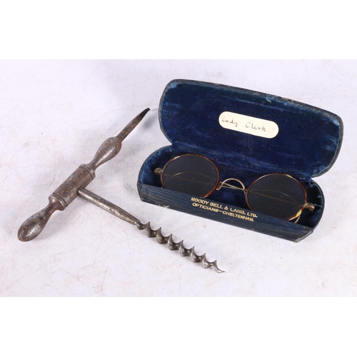 107 - Unmarked steel corkscrew and a pair of tortoiseshell rimmed spectacles.  (2)