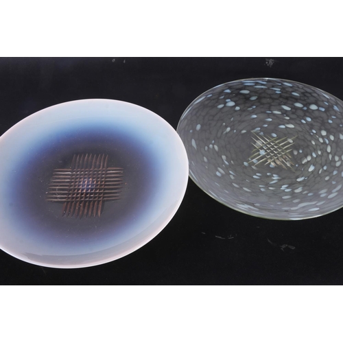 110 - Two Art Glass shallow dishes, one with mottled blue dab effect, 28cm diameter.