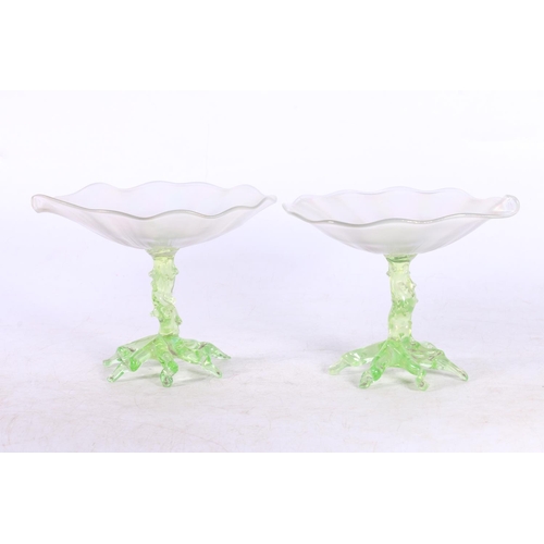 116 - Pair of Czechoslovakian lustre glass pedestal bowls of lily pad form, raised on naturalistic bases, ... 