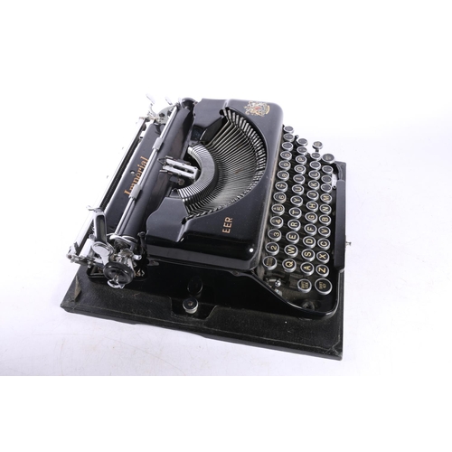 28 - Imperial EER Model T typewriter in original carrying case.