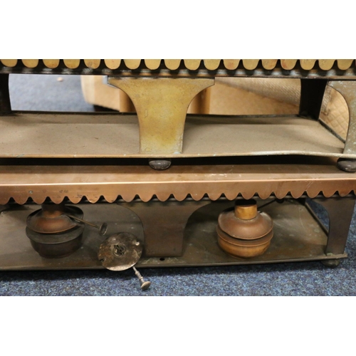 307 - Three antique brass and copper food warmers.