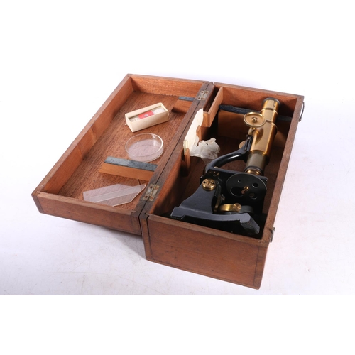 37 - Students microscope in original mahogany case.