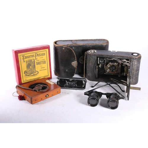 40 - Kodak bellows camera in black leather case, a Thornton Pickard shutter in original cardboard box wit... 