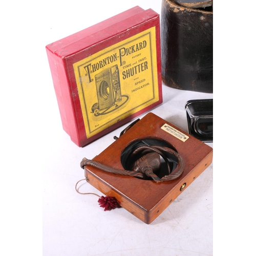 40 - Kodak bellows camera in black leather case, a Thornton Pickard shutter in original cardboard box wit... 