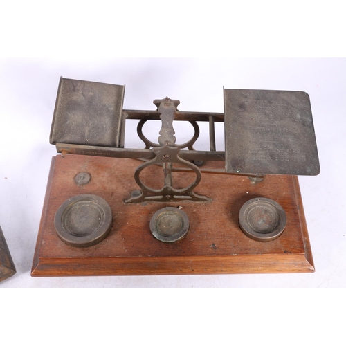 74 - Four sets of postal scales with weights. (4)