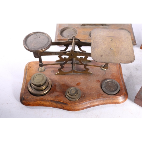 74 - Four sets of postal scales with weights. (4)