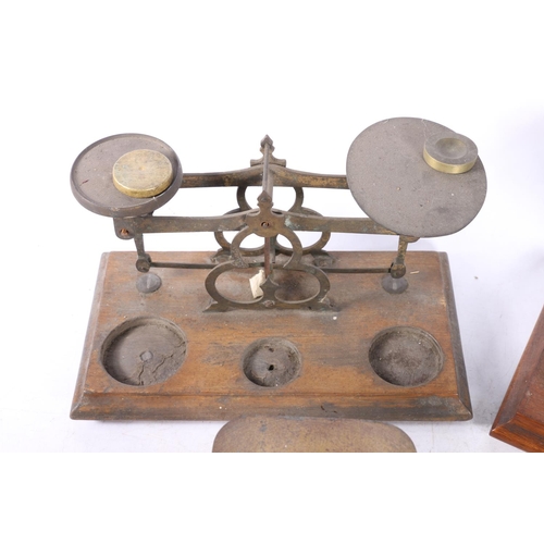 74 - Four sets of postal scales with weights. (4)