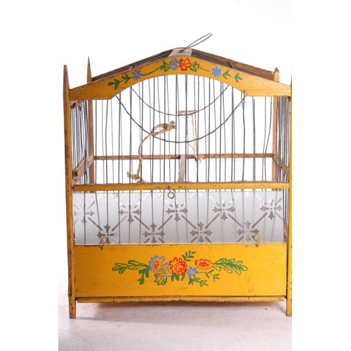 79 - Eastern European painted wooden birds cage, 29cm tall.