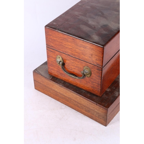 82 - Antique mahogany hinge top box with twin brass carrying handles, 28cm long and another. (2)