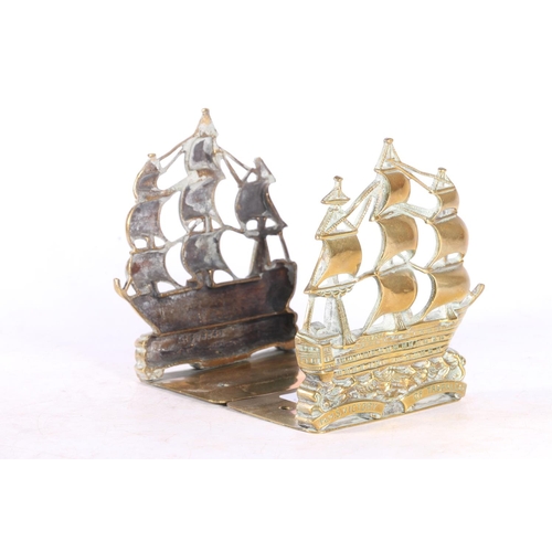 97 - Pair of pierced brass bookends modelled as the ship HMS Victory, 15cm tall.