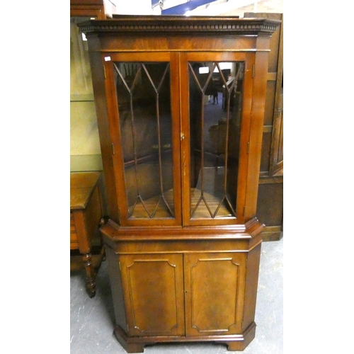 380 - Modern mahogany astragal glazed corner cupboard.