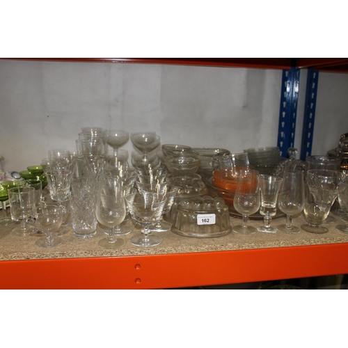 162 - Glassware to include jelly moulds, drinking glasses, fruit bowls, etc.