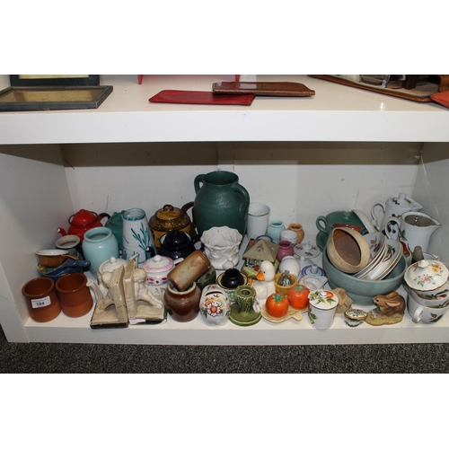 184 - Ceramics to include Royal Worcester oven to table ware, a Doulton teapot, bookends, a rabbit model, ... 