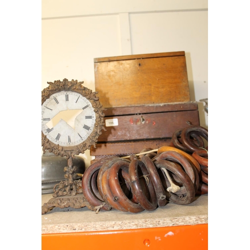 186 - Two hinge top wooden boxes, wooden curtain rings, and a leather box.