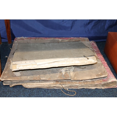 303 - Three large antique book binders with a quantity of unused paper.