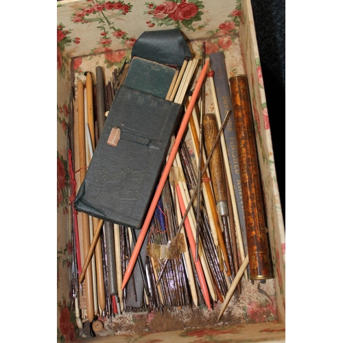 304 - Two boxes of antique knitting needles some in fabric binded sets.