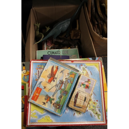 339 - Vintage children's toys to include jigsaws, dinosaurs, an abacus, a glockenspiel, etc.