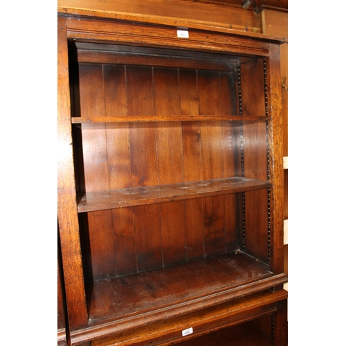 403 - Titchmarsh and Goodwin Cabinet Makers of Ipswich, an open bookcase with two adjustable shelves, 82cm... 