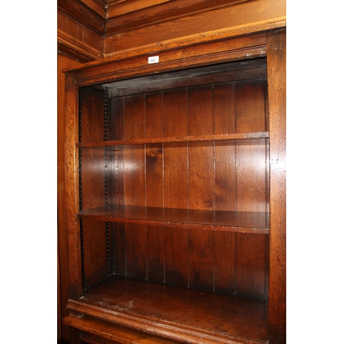 405 - Titchmarsh and Goodwin Cabinet Makers of Ipswich, an open bookcase with two adjustable shelves, 82cm... 