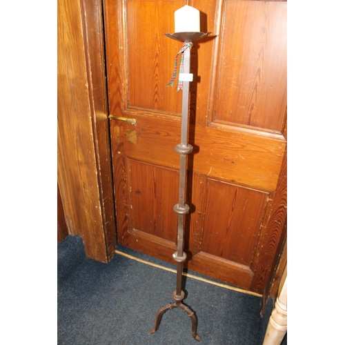 410 - Cast metal candle pricket stand, 126cm long.