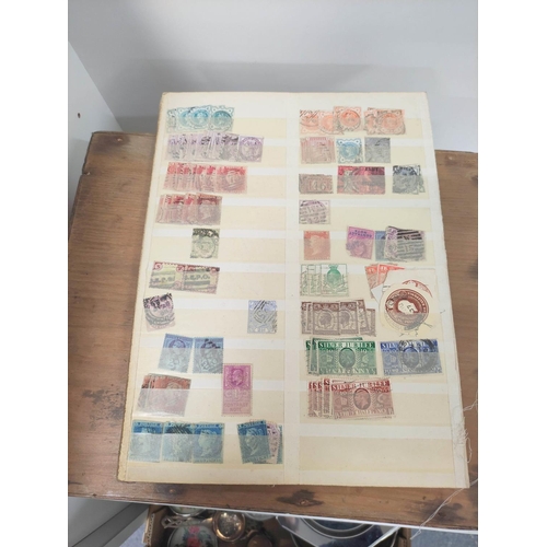 191 - Box of various curios to include postage stamp album sheets, three imperforated two penny blues, pen... 