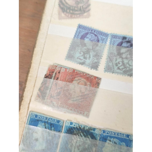 191 - Box of various curios to include postage stamp album sheets, three imperforated two penny blues, pen... 