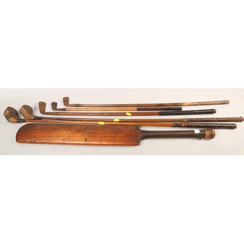 476 - Assorted hickory golf clubs and cricket bat