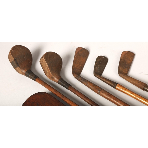 476 - Assorted hickory golf clubs and cricket bat