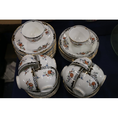 126 - Tuscan China black floral decorated part teaset.