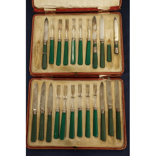 131 - Part set of Art Deco fruit knives and forks with silver collars and green handles in fitted cases by... 