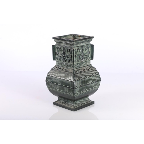 138 - Oriental green cast bronzed metal vase, 16cm high.