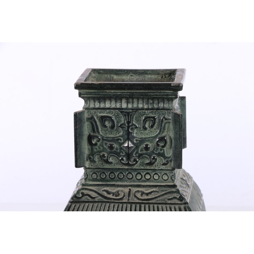 138 - Oriental green cast bronzed metal vase, 16cm high.