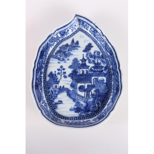 139 - Chinese blue and white porcelain dish of boteh form decorated with pavilion garden scene, 19cm high.