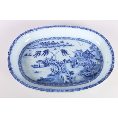 140 - Chinese blue and white oval dish decorated with pavilion scene, 25cm long.