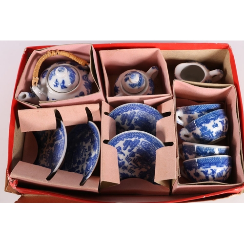 141 - Chinese style miniature blue and white toy china tea service in original box.