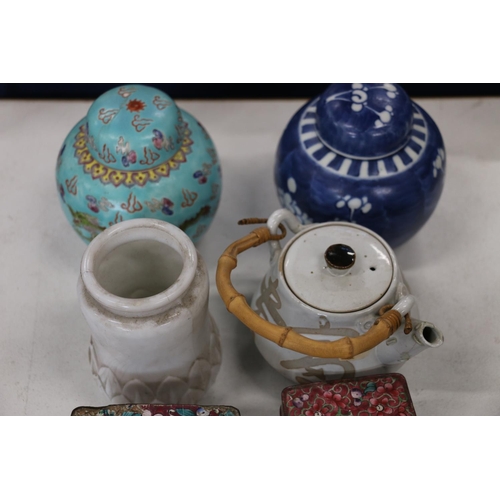 142 - Oriental items to include two cloisonné boxes and covers, a a blue and white ginger jar and cover, a... 