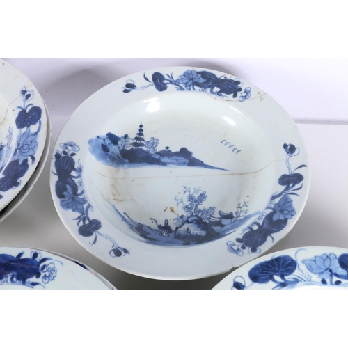 143 - Eight Chinese blue and white dishes decorated with pavilion scene, 23cm diameter.  (a/f)