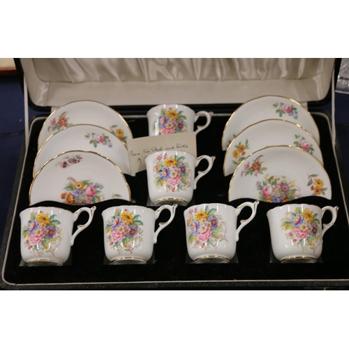 151 - Coalport Fragrance six place floral decorated coffee set, in fitted case.