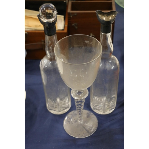 154 - Pair of glass ewers with silver collars, 32cm high, and a large glass goblet raised on barley twist ... 