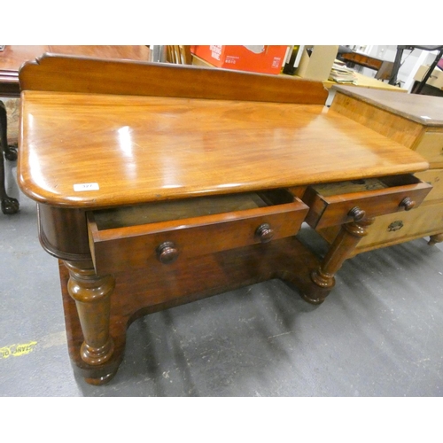 327 - Victorian mahogany side table fitted with two drawers. 105cm wide.