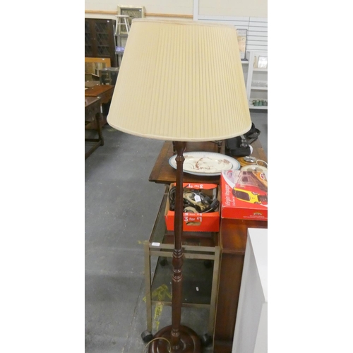 330 - Modern mahogany standard lamp.