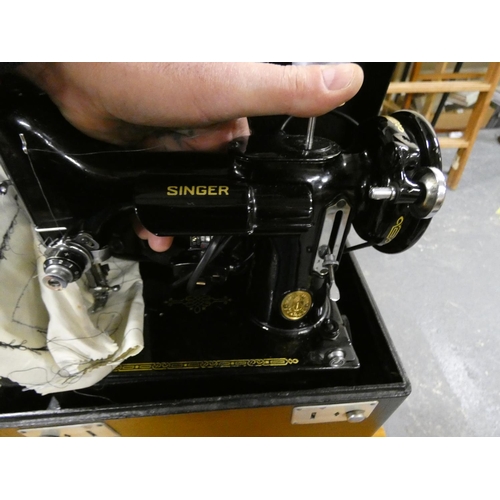 386 - Small cased sewing machine.