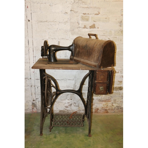 201 - Vintage Singer sewing machine on treadle base.