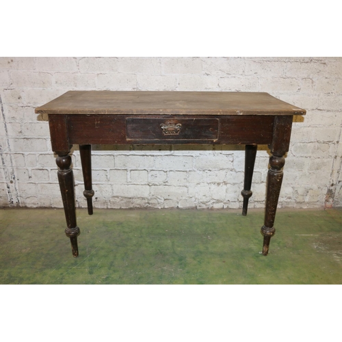 203 - Victorian painted pine side table with frieze drawer, raised on turned supports, 115cm long.