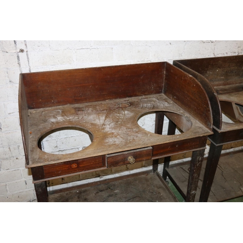 208 - Pair of 19th century mahogany washstands, raised on square tapering supports, capped by brass castor... 