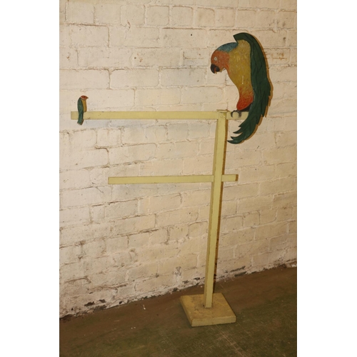 236 - Vintage painted two bar towel rail with parakeet design, 137cm high.